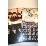 Collection of four The Beatles LP records including With The Beatles, A Hard Days Night, Beatles For