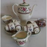 Royal Cauldon tea service, transfer printed and enameled with foliage on a cream ground and a