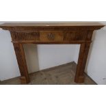 Yorkshire oak fire surround, mantel with dentil cornice, tablet carved with Yorkshire Rose on fluted