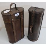 Late 20th C campaign style double bottle carrier and a similar single bottle carrier