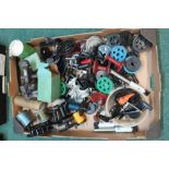 Large quantity of sea, fly and coarse fishing reel parts including handles, cages, spools, some line