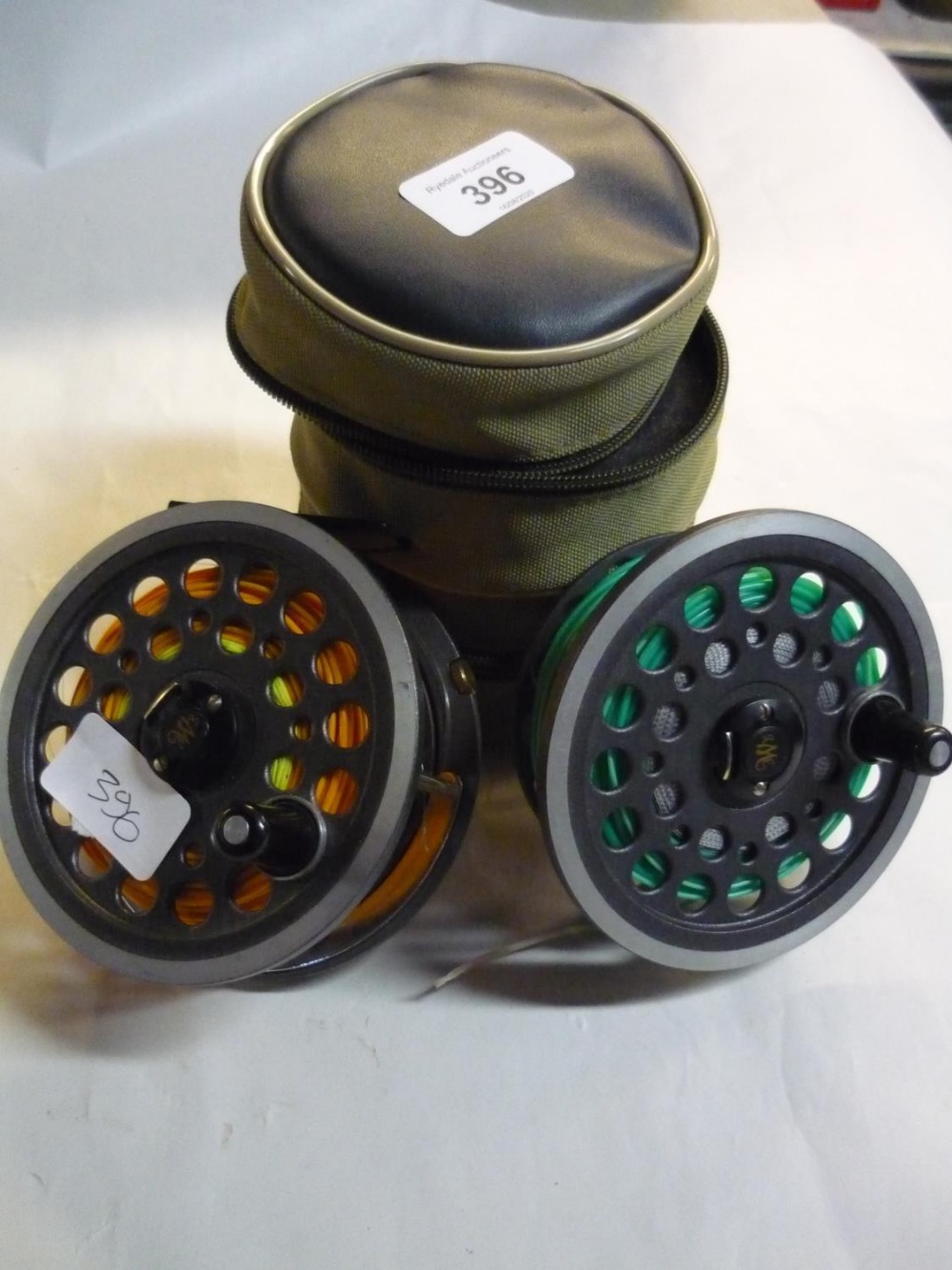 J W Young & Sons Ltd 1540 salmon fishing reel, with two spare spools, in Snowbee zip case