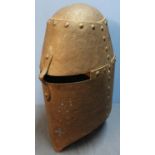 English steel closed type helmet with eye slit and single nasal bar, with riveted detail to the