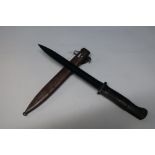 German Mauser bayonet with 10 inch blackened blade stamped S/242G and 5911 with two piece wooden