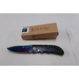 As new Elk Ridge folding knife, 2 1/2 inch blade with black handle