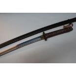 Mid 20th C Japanese sword with 26 1/2 inch blade, pierced bronze tsuba, cast metal grip complete