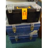 Three modern plastic tackle boxes containing a large quantity of lures, spinners, tube and other