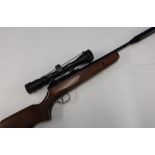 BSA break barrel action air rifle with moderator and Hawke scope