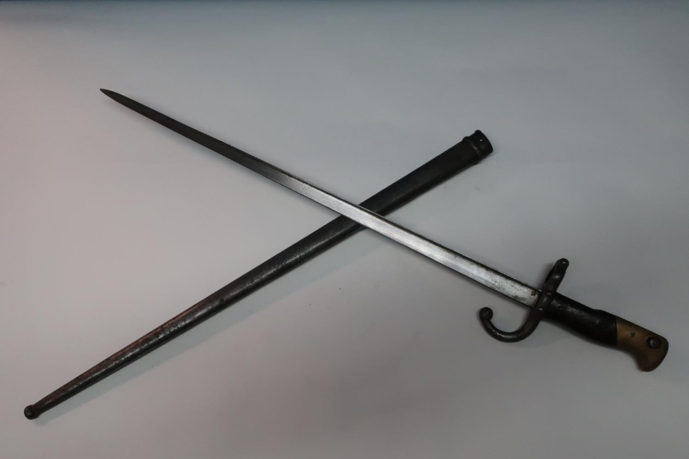 French gras type bayonet with 20 1/2 inch blade, with broad backstrap marked 1878 with two piece