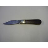 A Wright & Son of Sheffield single bladed pocket knife with wooden grips