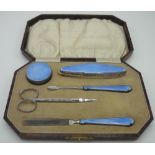 George V hallmarked silver and blue enamel five piece manicure set with steel scissors, in