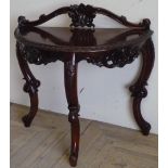 Mahogany finished demi lune hall table, carved scrolled back, carved and pierced, French style