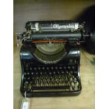 Olympia MOD. 8 typewriter with Qwerty keyboard and cover