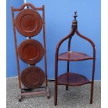 Edwardian inlaid mahogany two tier plate stand, and a 1940's three tier folding cake stand (height