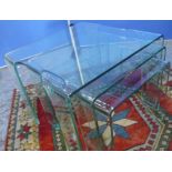 Nest of three rectangular shaped tinted glass tables (55cm x 44cm)