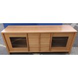 Willis and Gambier Escana dining oak wide side board with four drawers enclosed by two cupboard