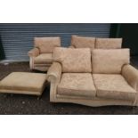 Traditional style three piece suite comprising a pair of two seat sofas, an armchair and
