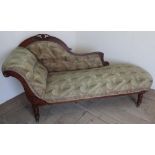 Victorian walnut framed chaise lounge with pierced scroll cresting, on turned supports (175cm x