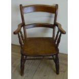 Late 19th Century beech elbow chair, outsplayed arms on turned legs
