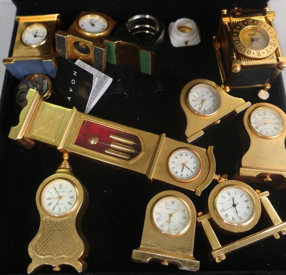 Collection of miniature quartz clocks including long-case, lantern etc (10)