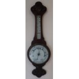 Late Victorian carved mahogany framed aneroid barometer