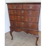 Early 19th C inlaid walnut chest on stand with two short above three long drawers, on shaped apron