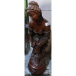 Large bronze effect early 20th C style figure of a semi-clad lady releasing a bird, on circular base