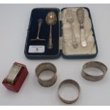 Collection of Victorian and later silver, including cased spoon and pusher, four napkin rings,