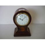 Edwardian inlaid mahogany balloon shaped mantel timepiece, with cream Arabic dial, (height 22cm)