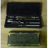 Two cased drawing sets