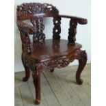 20th Century Carved Eastern hardwood chair, curved demi-lune back on stylised cabriole legs