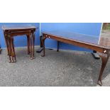 Reproduction nest of walnut tables with figured tops and a similar rectangular coffee table (2)
