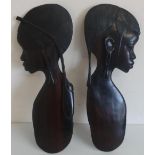 Pair of Eastern carved hardwood wall plaques in the form of females (height 59cm) (2)