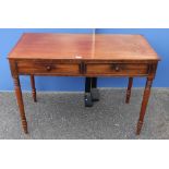 19th C mahogany two drawer side table with turned wooden handles, on ring turned tapering