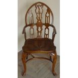 Gothic style Windsor type armchair, arched back and solid seat on cabriole legs with curved under