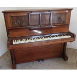 Mahogany cased C. Bechstein of Berlin upright piano with brass candle sconces