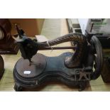 Vintage sewing machine, possibly Smith & Sons, shaped base with scroll feet and gilt detail (