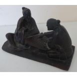 Chinese carved hardwood figure of two gentleman playing a boardgame (10cm x 20cm x 10cm)