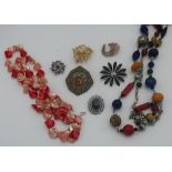 Collection of costume jewellery including ladies Rotary wrist watch, beads, souvenir wares etc