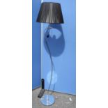 Metal standard lamp with S scrolled column and blue shade