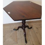 George III mahogany tripod table, the hexagonal tilt top on vase turned column and three out splayed