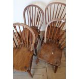 Set of three 20th C elm and ash Windsor chairs, hoop and stick back and turned supports, one stamped