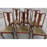 Late Victorian wind-out extending mahogany dining table on ball and claw feet and a set of six (