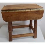 Yorkshire oak craftsman made Mouseman style drop leaf occasional table on four supports with