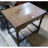 19th C oak rectangular centre table, with molded top and shaped frieze, on turned supports with