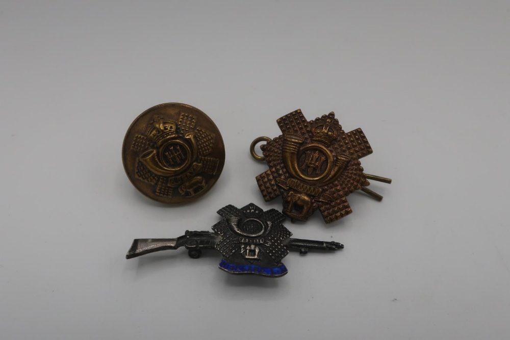 Hallmarked silver and blue enamel Highland Light Infantry sweetheart brooch, Birmingham 1915; and