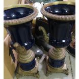Pair of blue ceramic and gilt metal urn garnitures (height 51cm)