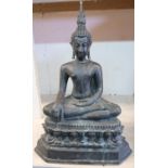 Eastern cast bronze figure of a seated Buddha type deity on stepped base (height 44cm)