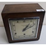 1930's oak cased Westminster chiming mantel clock with chrome plated bezel, retailed by "The