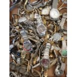 Quantity of quartz ladies and gentleman's wristwatches on bracelets